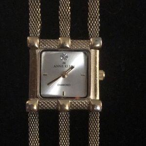 COPY - Anne Klein gold watch with diamond on face.